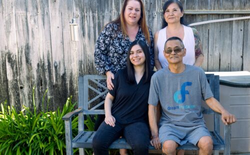 Navy Veteran and hospice care recipient, Kyu Cho, poses for a photo with his wife and sister, Anna.